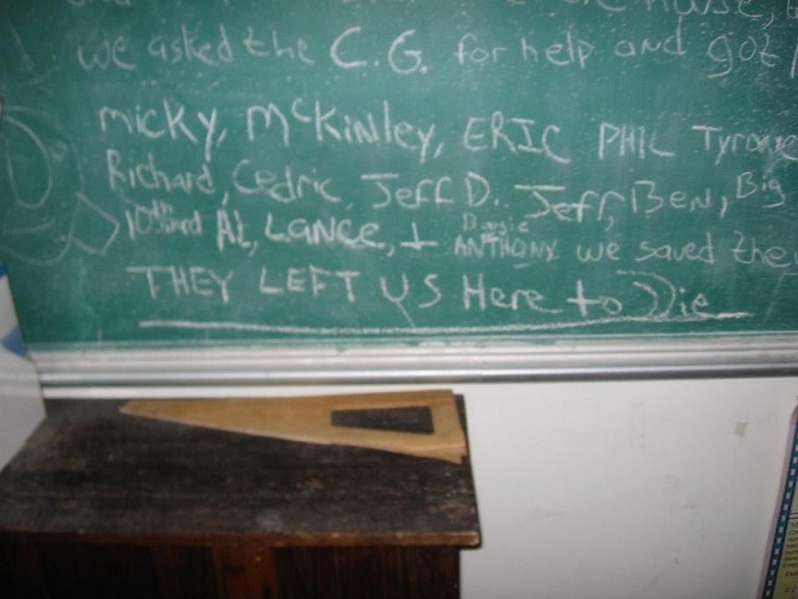 "They left us here to die" on a chalk board where we volunteers stayed.